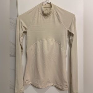 Women's Nike Sportswear Ribbed Mock-Neck Long-Sleeve Top | Cream Color |…